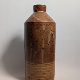 Thin neck vase in warm sand